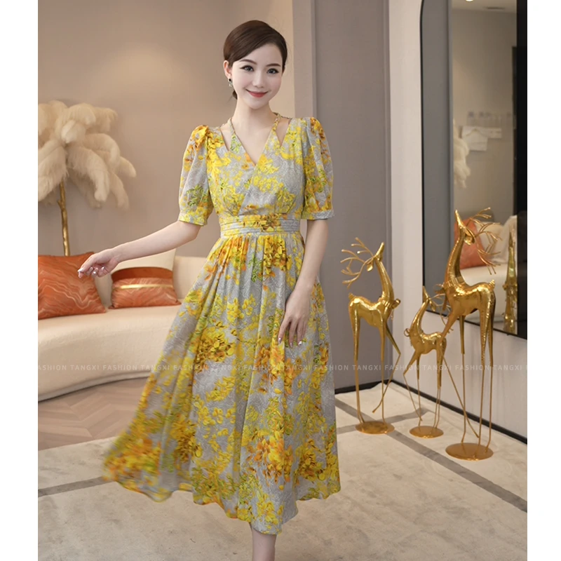 2026年夏季新款【7312】轻奢女装海边度假气质黄色碎花V领连衣裙