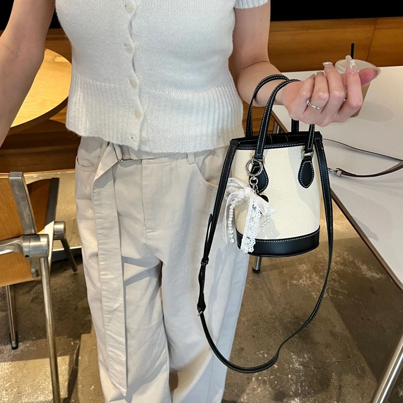 2025小众手机包女头层牛皮单肩斜挎包大容量拼色水桶包百搭通勤