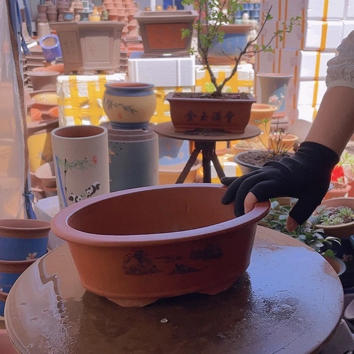 宜兴紫砂红椭圆30