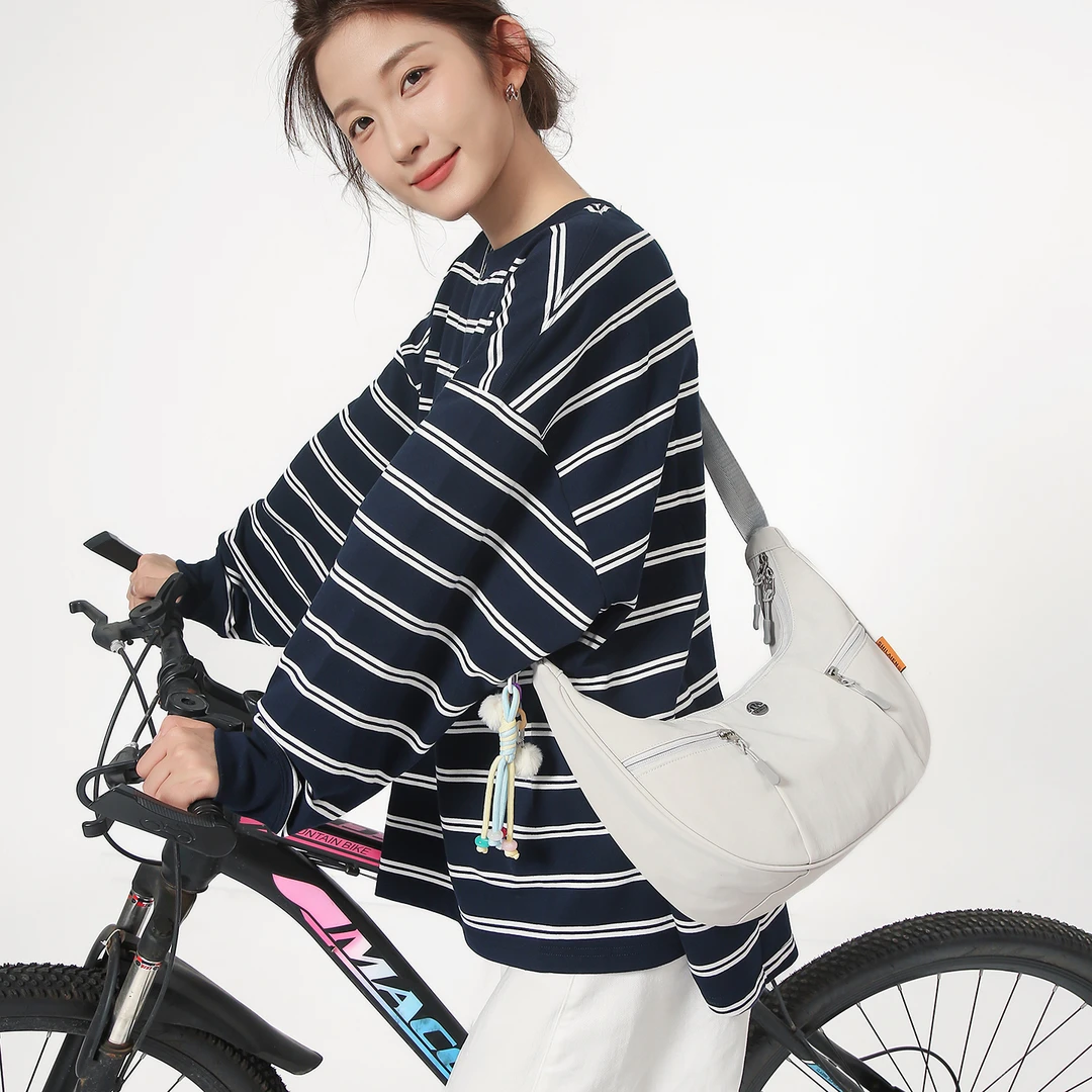 饺子包休闲简约风防水情侣斜跨潮流斜挎包拉链ins