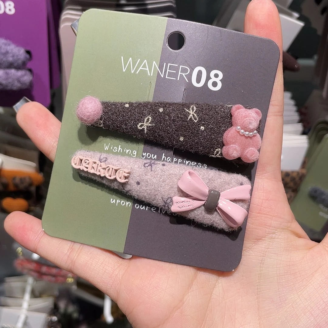 布艺非金属咖粉蝴蝶结小熊