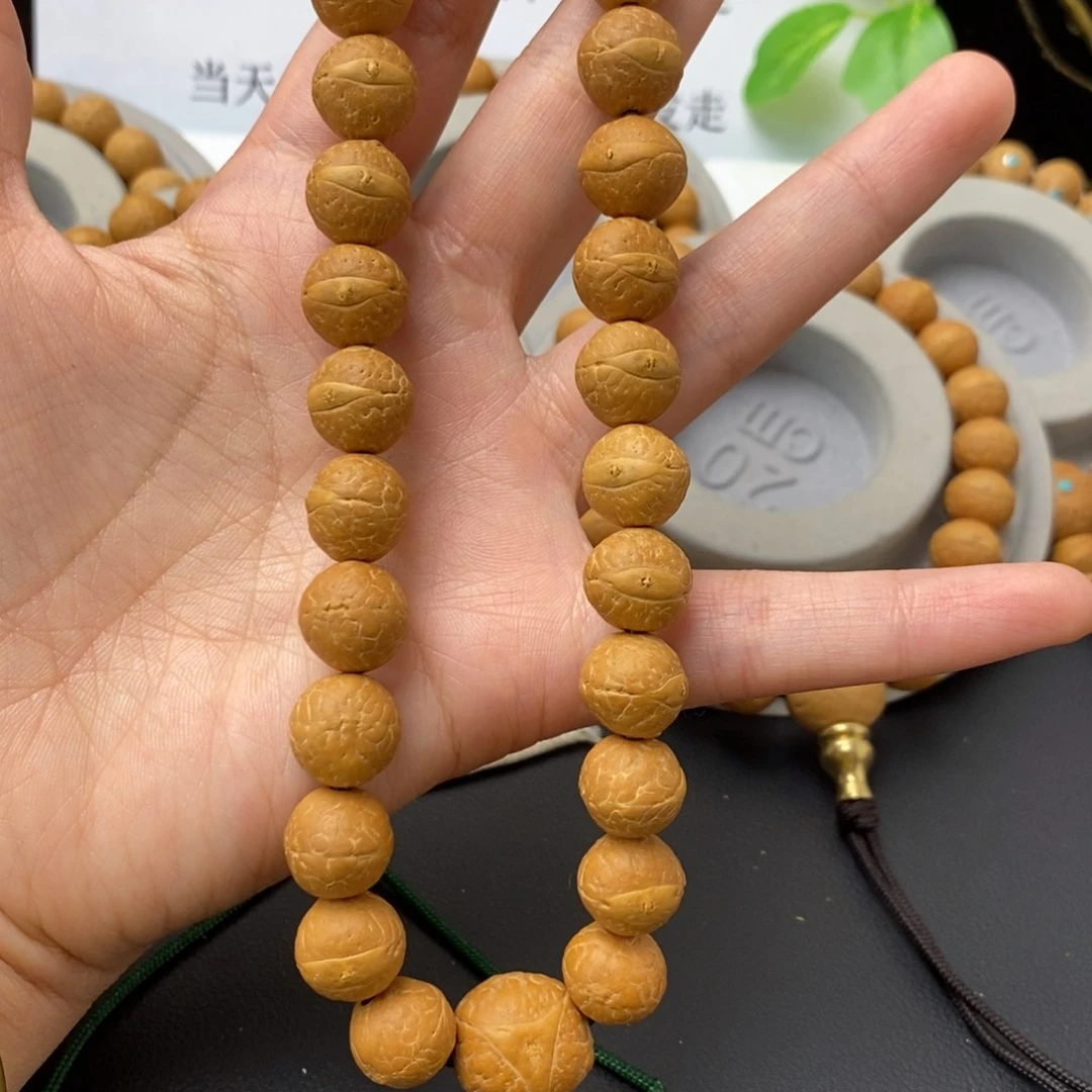 凤眼菩提吊坠12.5手持