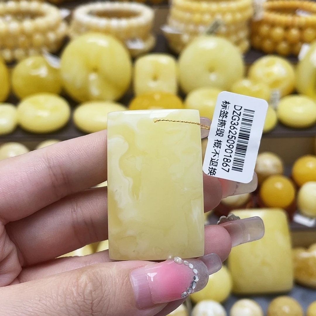 裸石琥珀未镶嵌27.8*43.2*11.8mm浓蜡妖白花牌子
