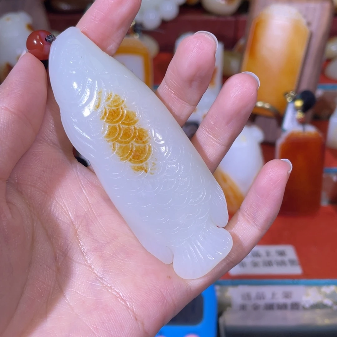 墨***。和田玉未镶嵌把件
