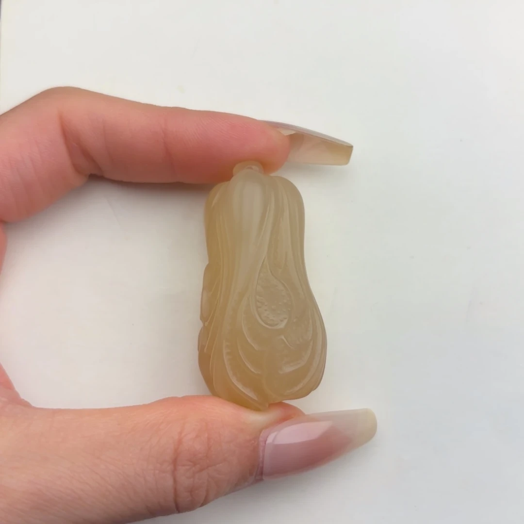 爱***机石英质玉未镶嵌黄蜡石挂件