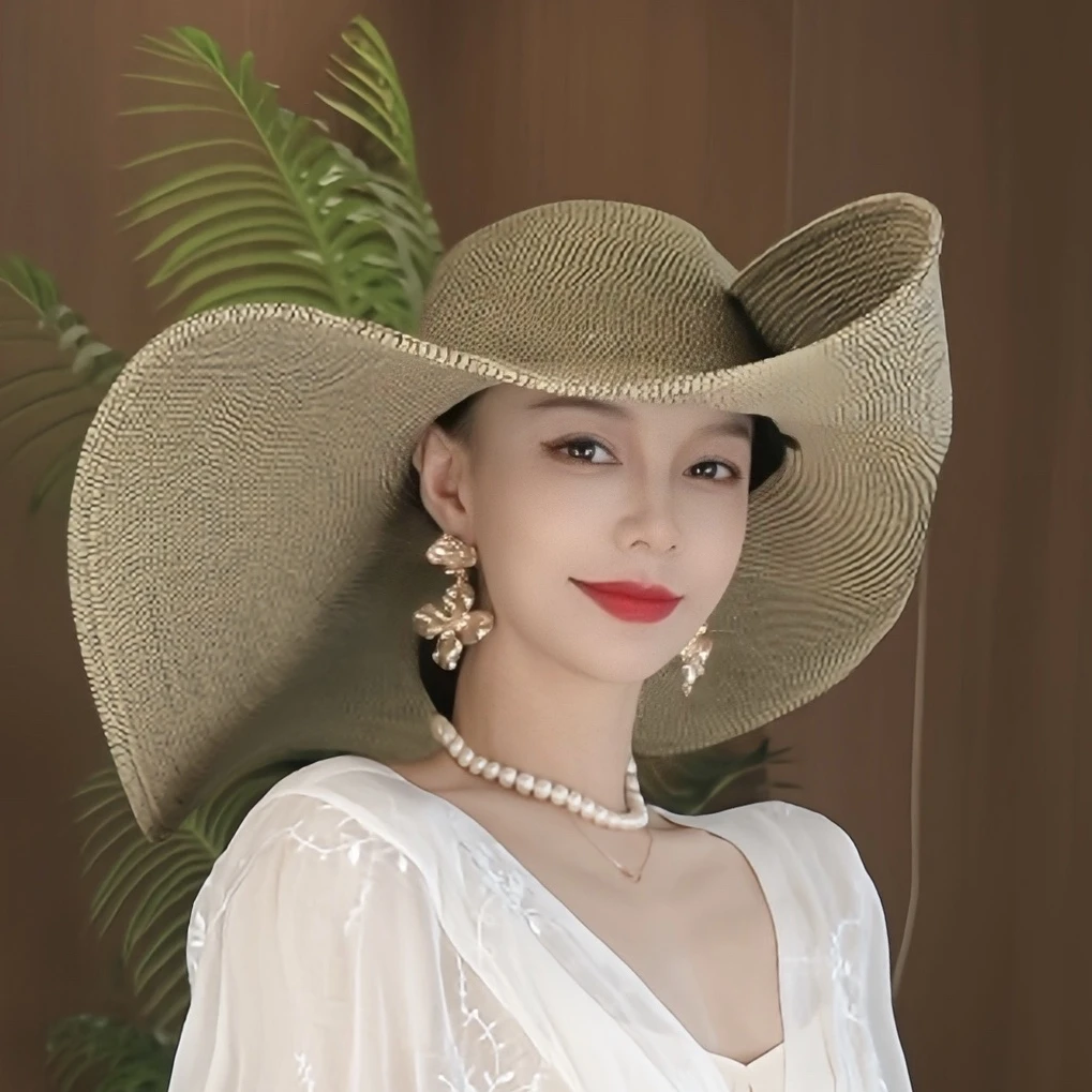 太一2025新款草帽女海边大帽檐沙滩遮阳帽可折叠法式防晒帽子