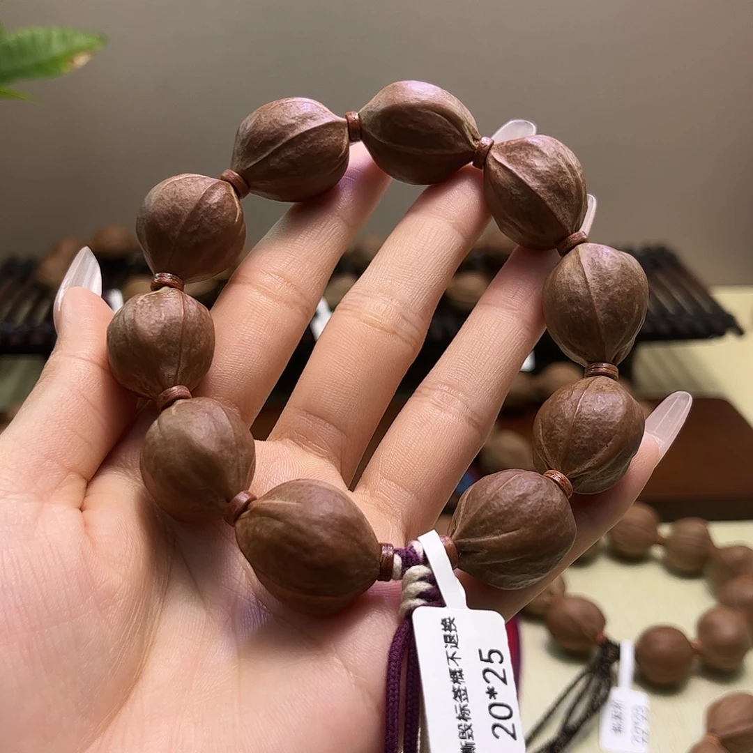 不***错吊坠橄榄核梅林铁核文玩手串