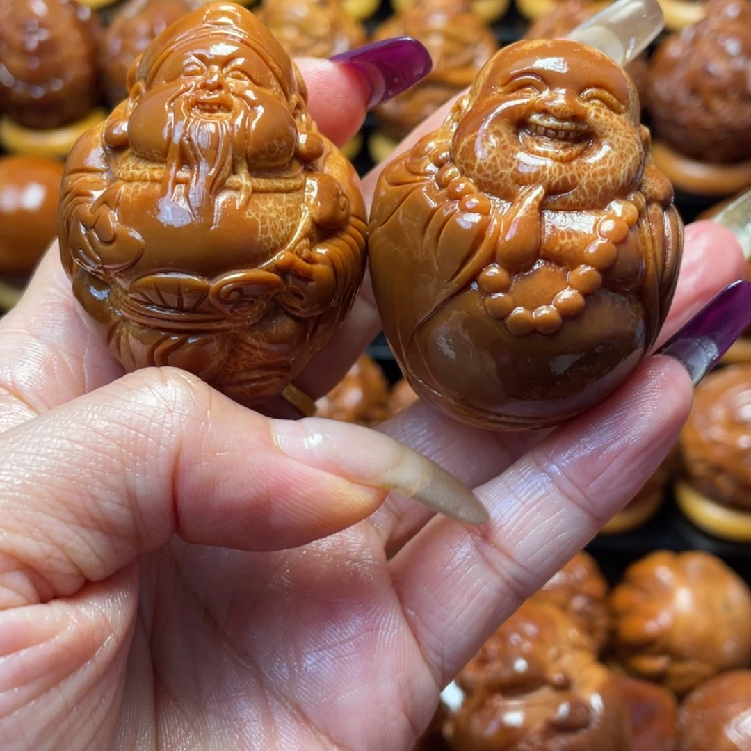 昨***辰把件橄榄核橄榄球