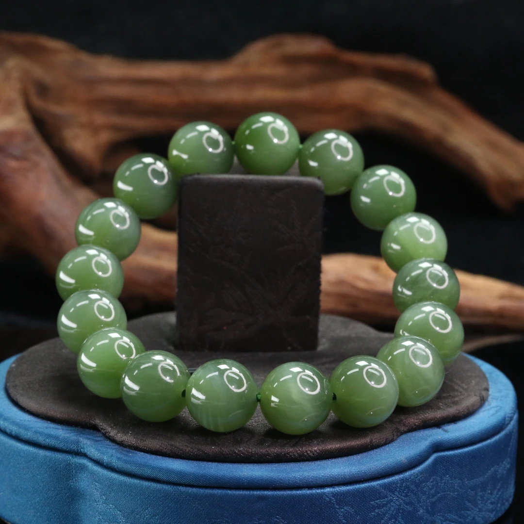 32和田玉俄七碧玉猫眼手串/501034上海嘉禾拍卖