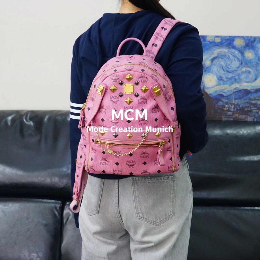 95新 MCM  粉色双肩包/YW04601030/1030