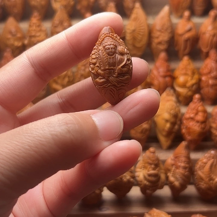 赵***四橄榄核吊坠橄榄核