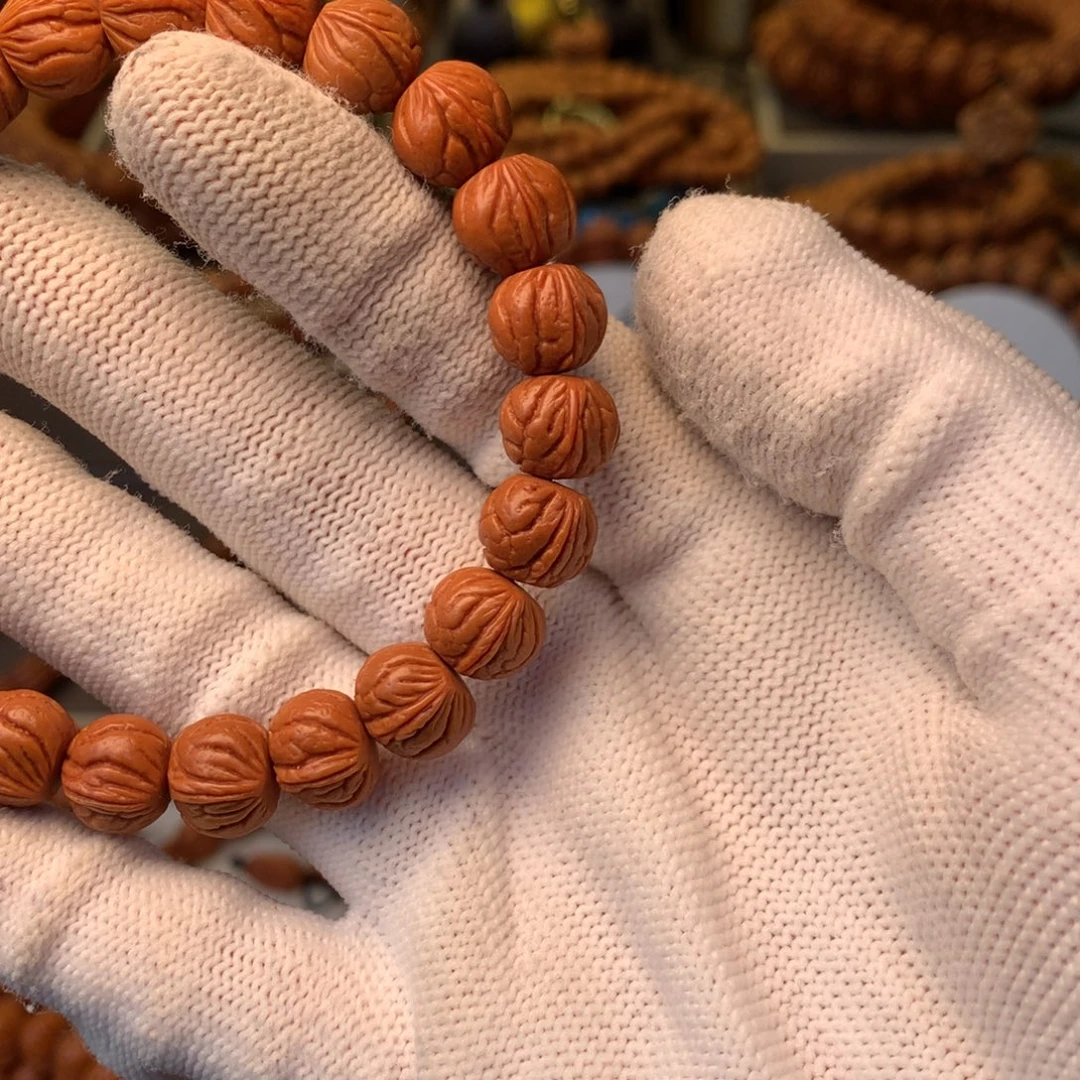 罗***）桃核手串秦岭龙纹