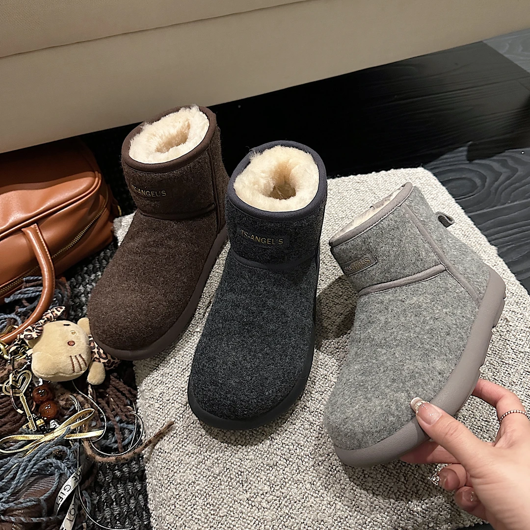 TS筒靴女2024冬季新款简约百搭纯色加绒厚底保暖套脚雪地靴