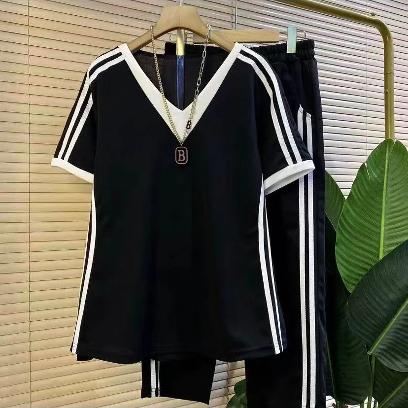 X欧货时尚新款拼条显瘦两件套套装