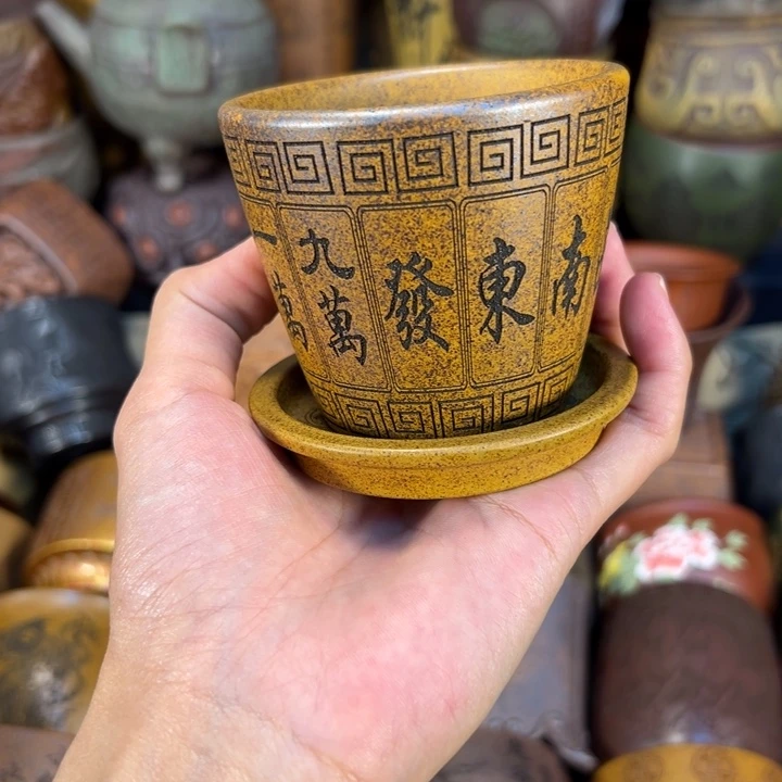 紫砂茶杯宜兴紫杯子