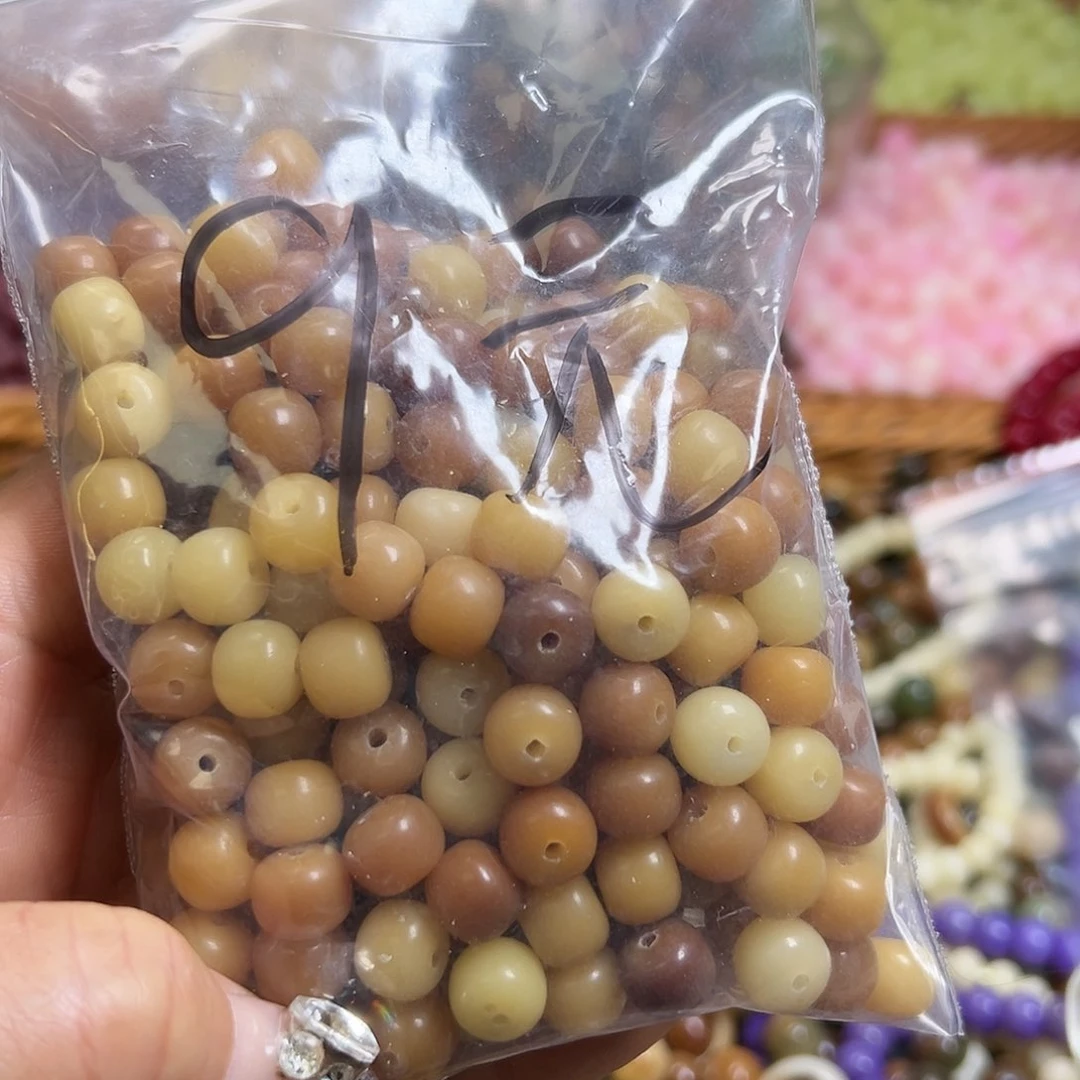 菩提根/象牙果吊坠M****工瑕疵10浅黄桶200颗