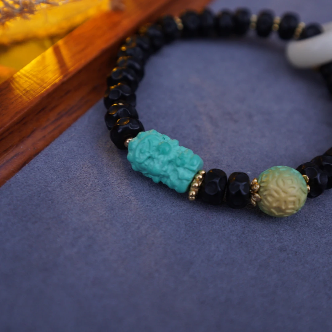 拉萨文创设计地黄财财雕刻椰蒂无相珠流苏手串