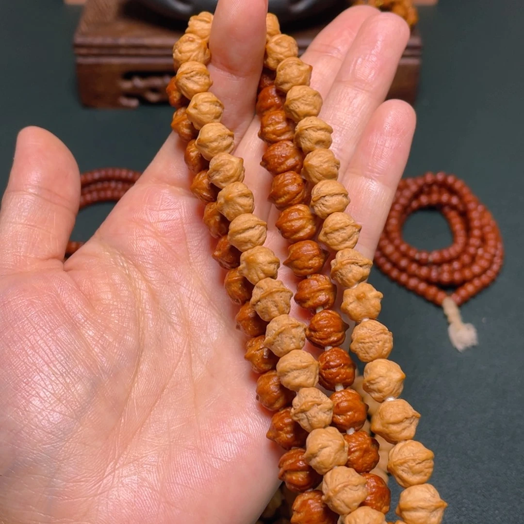 柏香籽/百香籽吊坠白牙横打手持