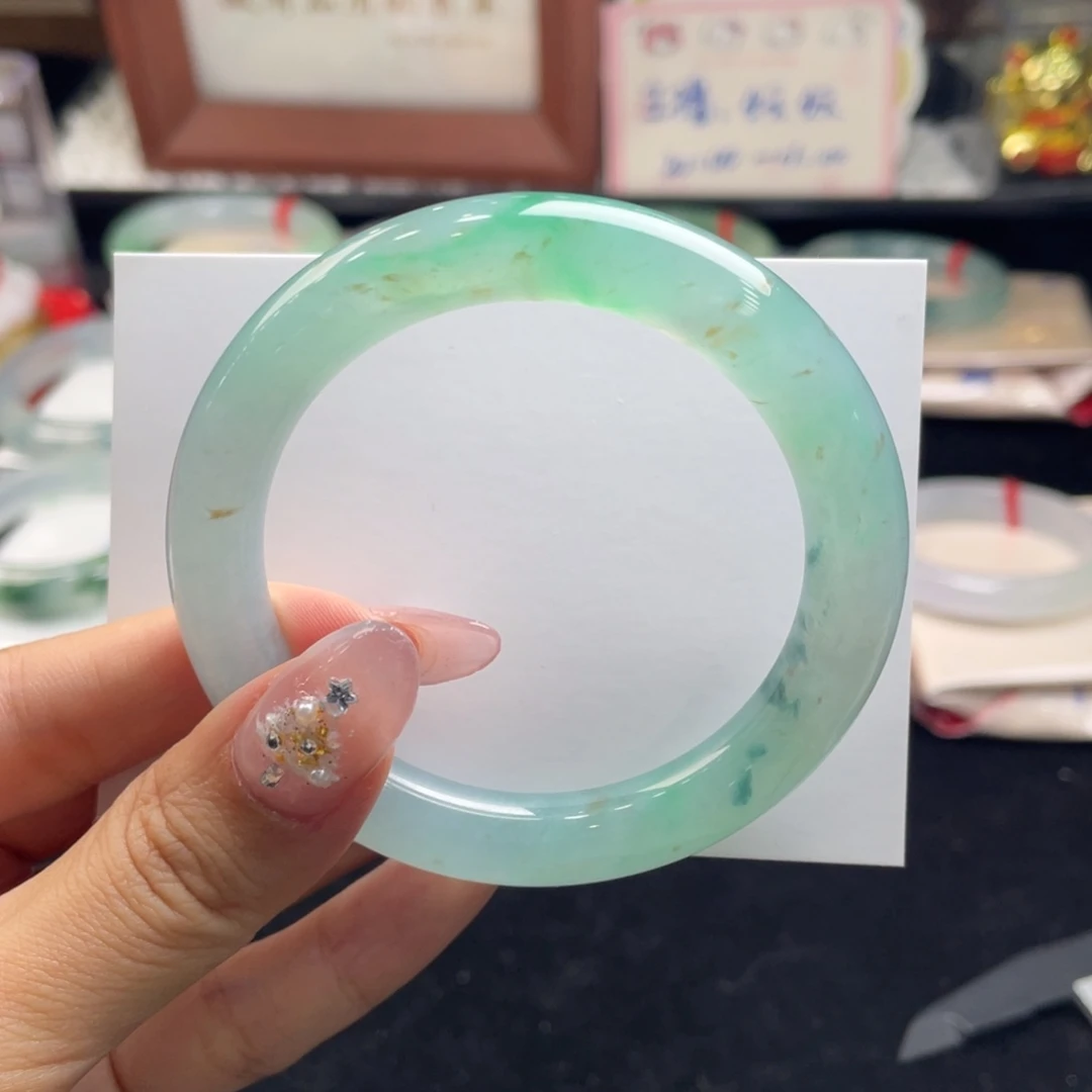 亦***n翡翠未镶嵌手镯53圆条锦鲤池（分单）2