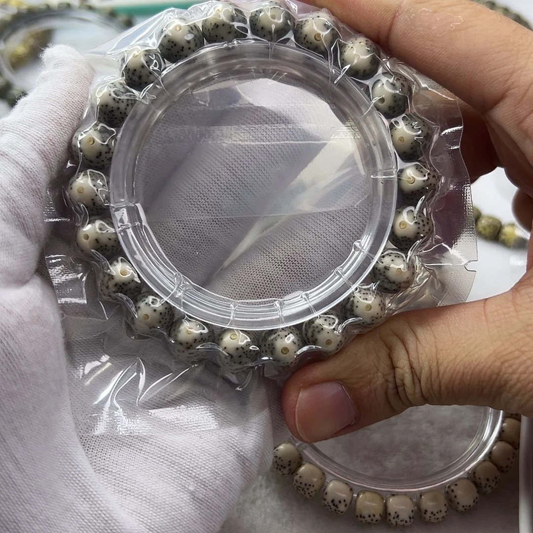 星月菩提手串10×9绿包白黄金瞳圆珠  107