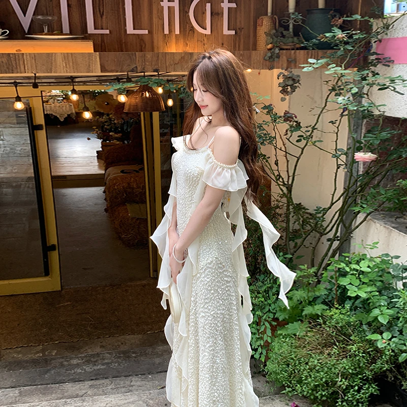 冰冰来了【月亮城堡】高级感优雅不规则吊带荷叶边钉钻连衣裙26138