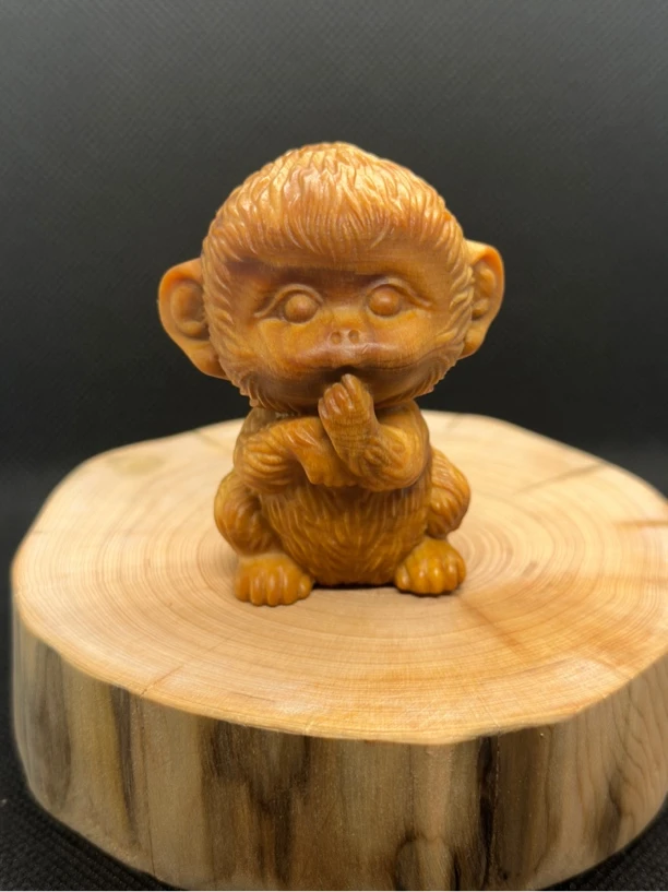 崖柏陈化料木雕猴子手把件