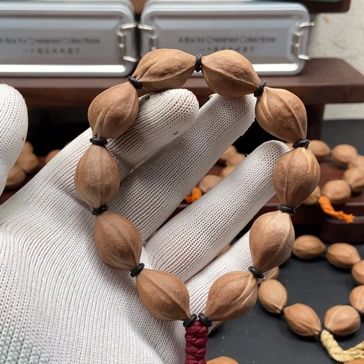 手串橄榄核1625三面佛