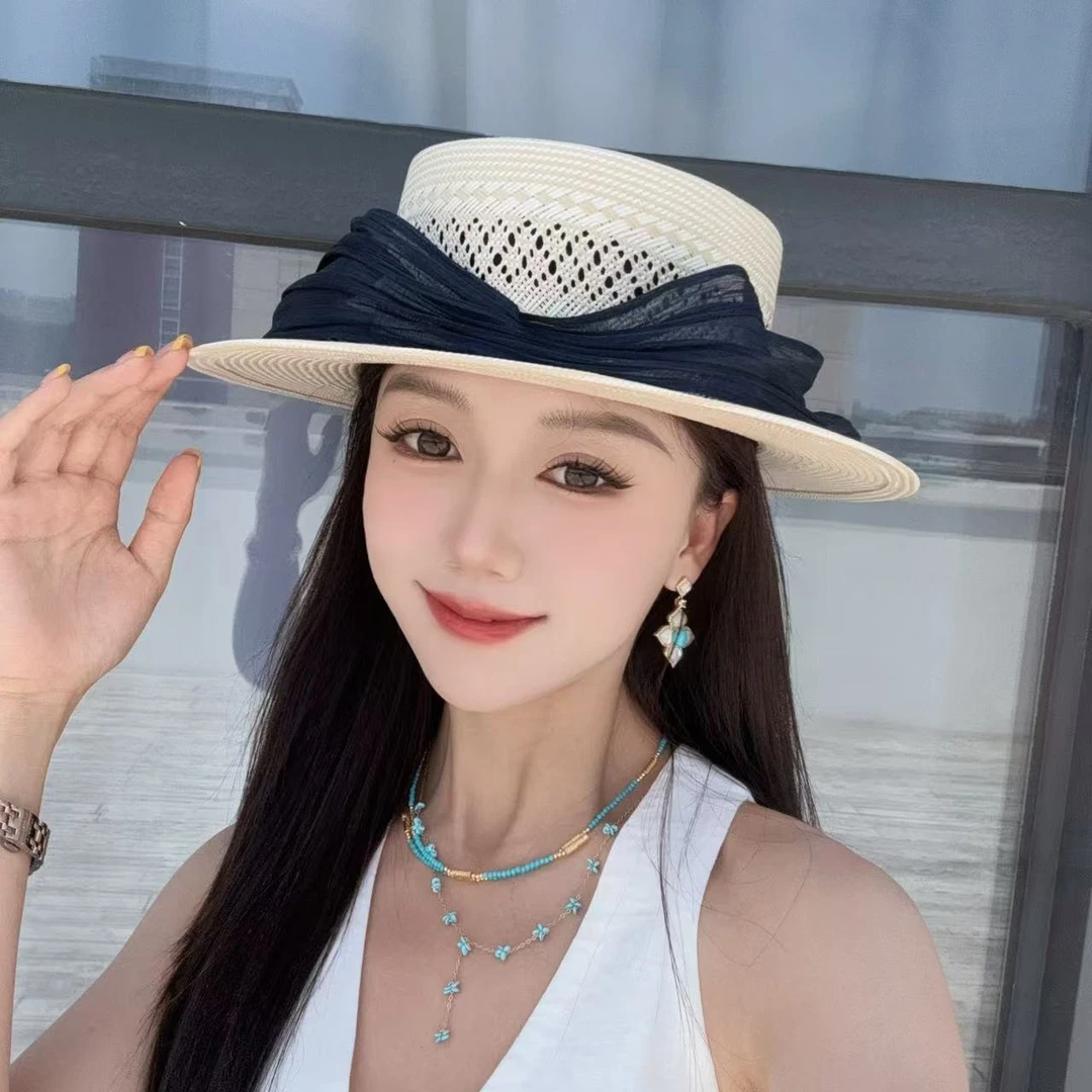 邱黎 · 三分草！镂空大波浪三分草编织帽1d2380