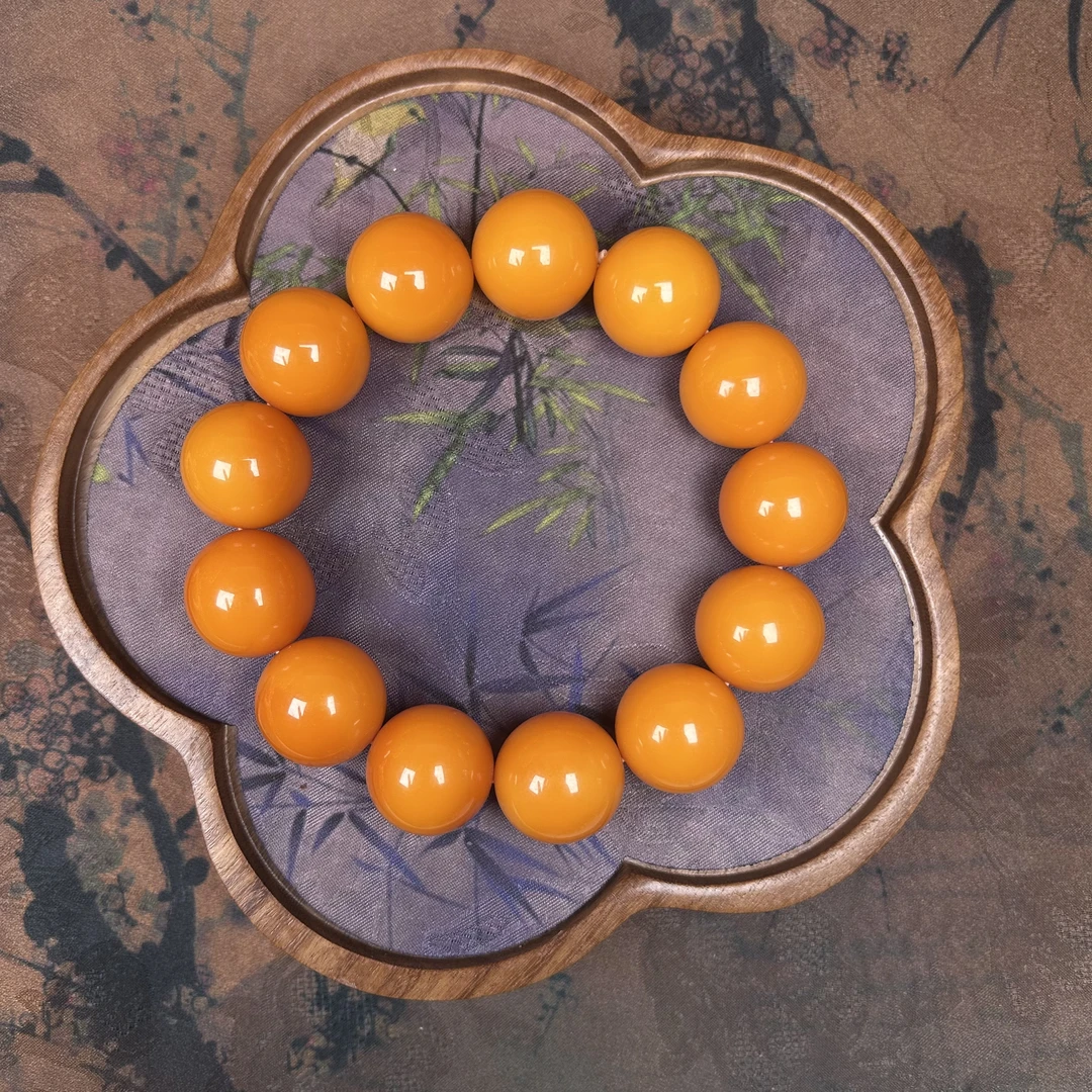 W0057金珀鸡油红老密手串