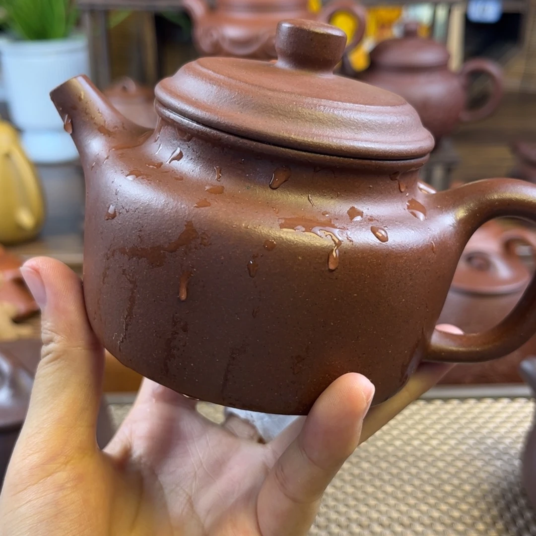 茶壶紫砂手工制作流口水