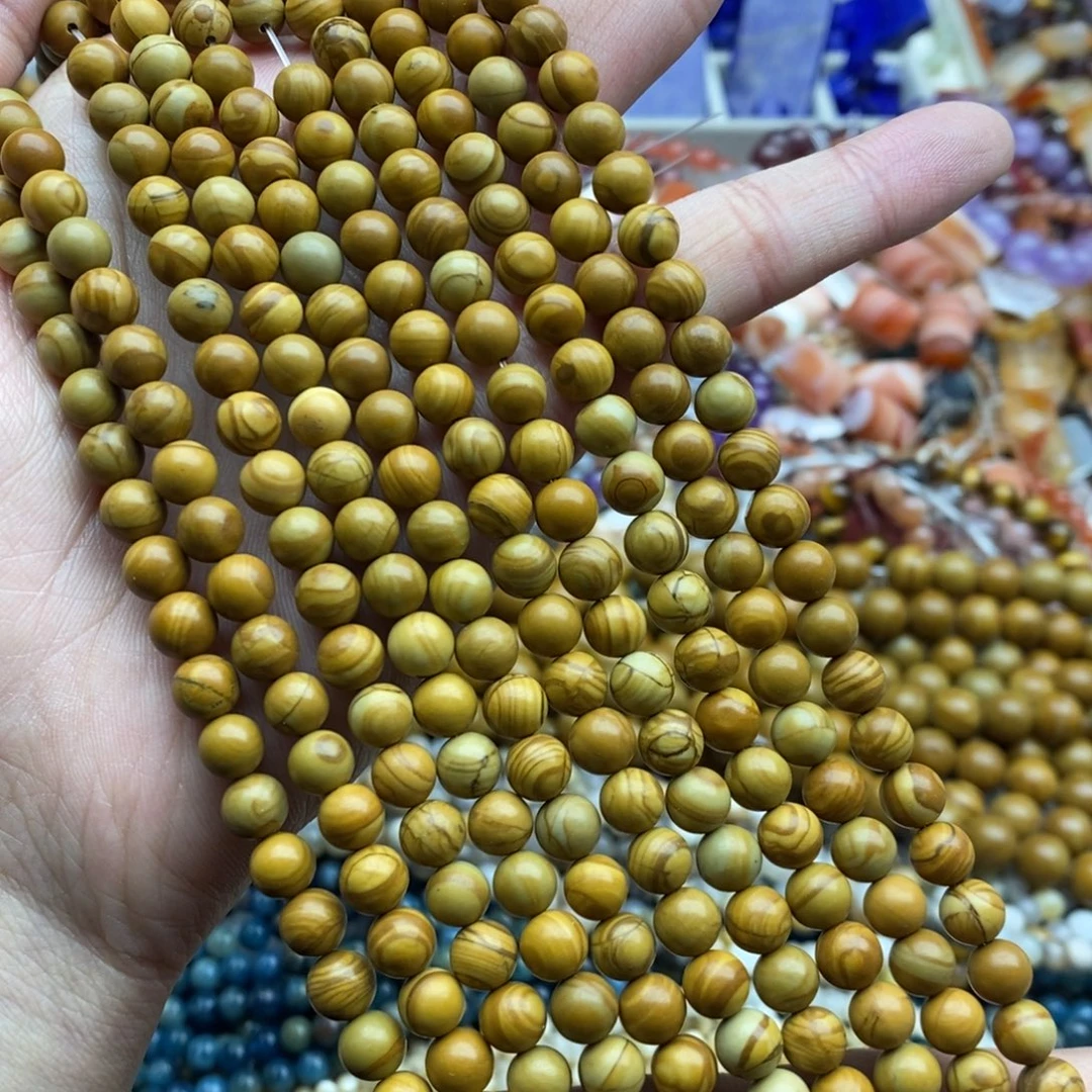 玛瑙/玉髓未镶嵌珠宝半成品一条天然6.5mm黄木纹石圆珠