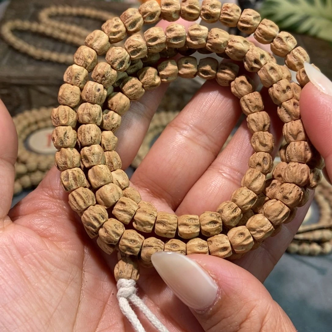 柏香籽/百香籽吊坠小****人