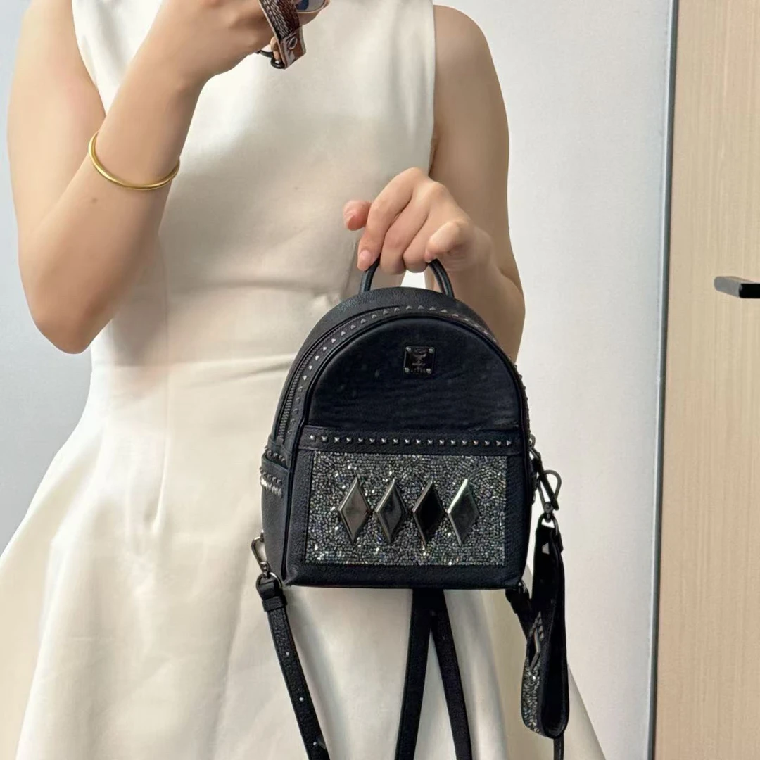 95新 MCM MCM黑色mini双肩包包95新/聪