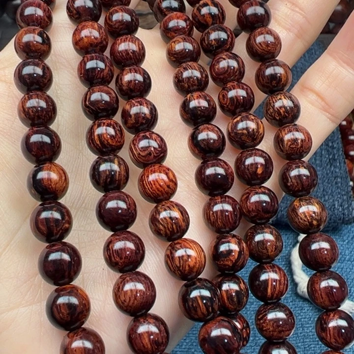 用***7木海南红降花梨公黑金树心油爆满妖纹08圆珠108颗