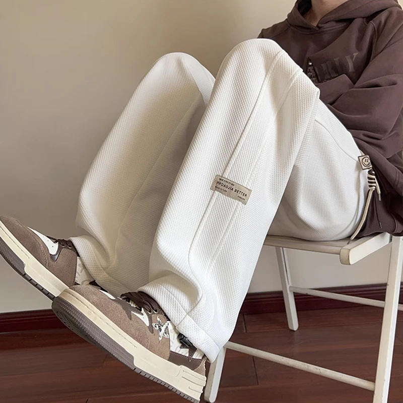 青少年裤子男士春秋款运动卫裤2025新款宽松直筒潮牌加绒休闲长裤