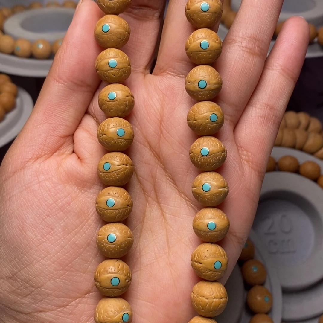 凤眼菩提吊坠手持