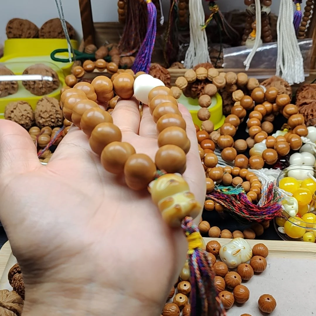 猴头核桃吊坠全品小屁桃手持