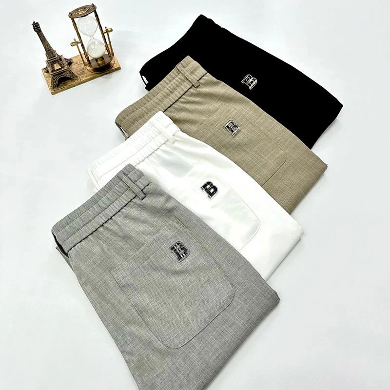 潮流百搭休闲裤男士2025春秋纯色简约小脚裤轻奢欧货时尚九分裤子