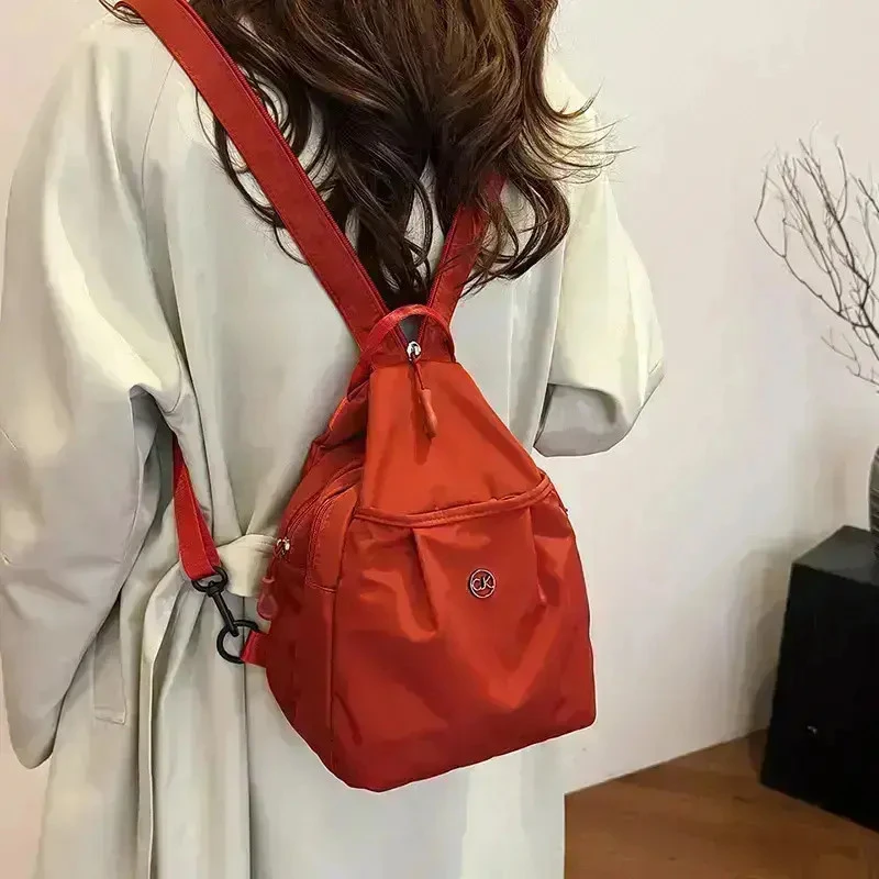 【便携旅行包】多功能多层时尚百搭双肩包胸包简约休闲斜挎包旅行包