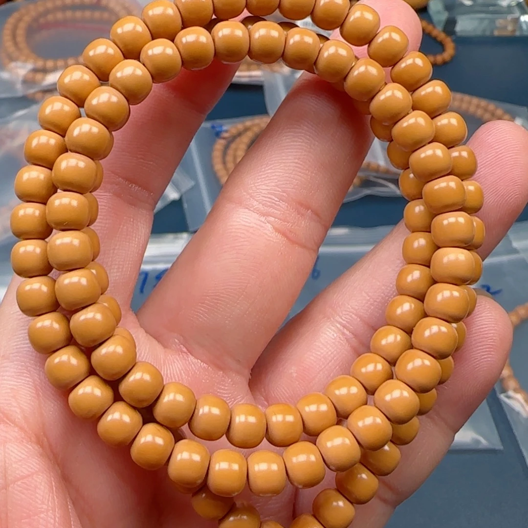 橄榄核手串老挝SS级核尖极限弧尺寸7.1全无白
