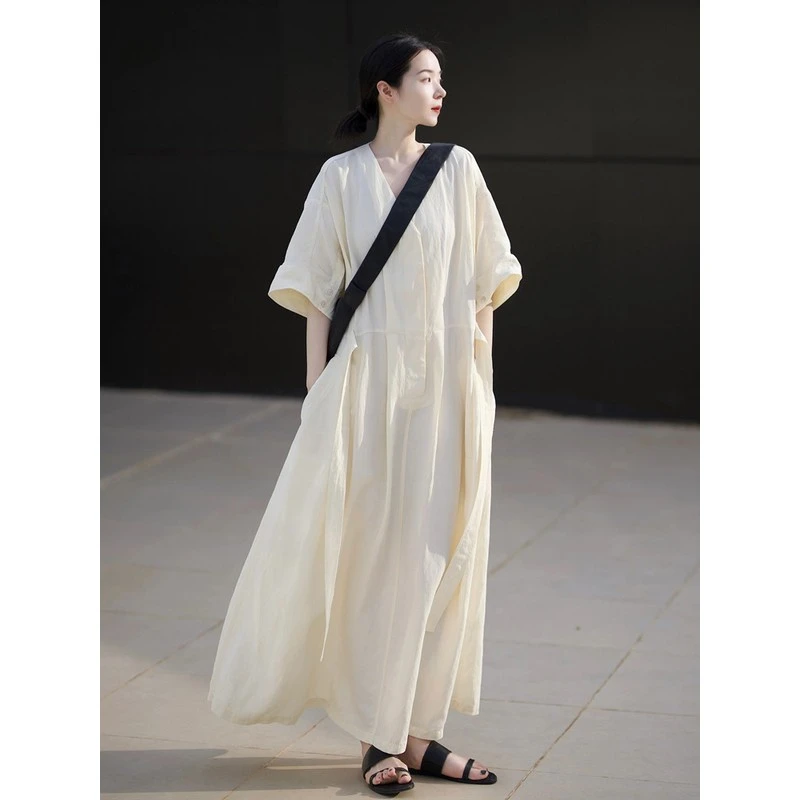 法式赫本风白色连衣裙女绝美气质夏季新款高级感宽松领大摆长裙