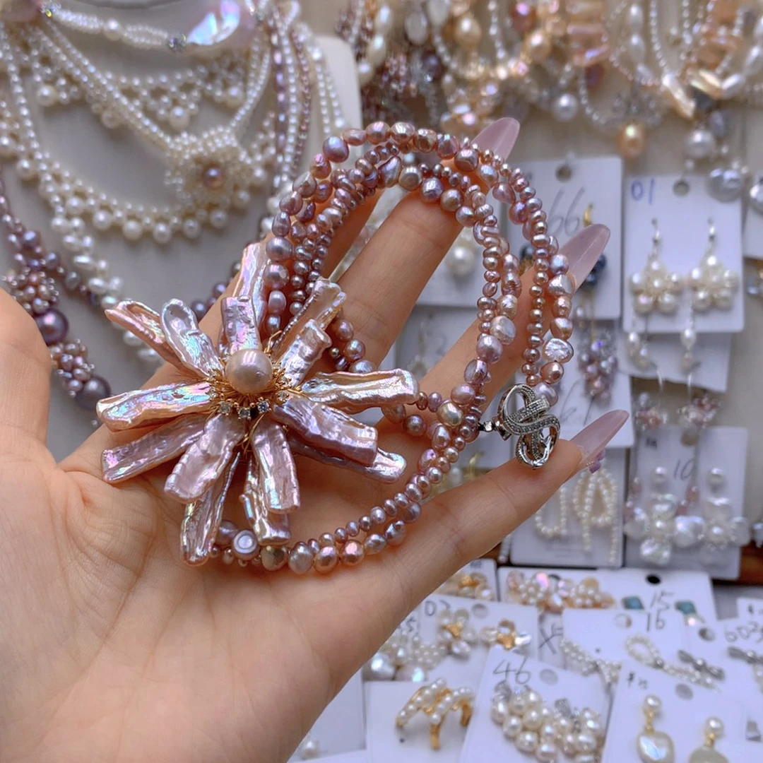 银S925镶嵌耳饰淡水珍珠星**妞