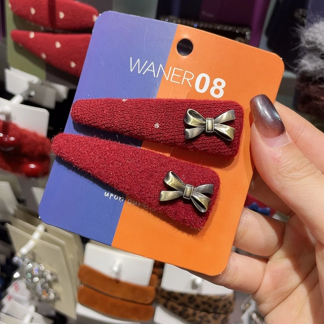 羽毛非金属红波点三角蝴蝶结