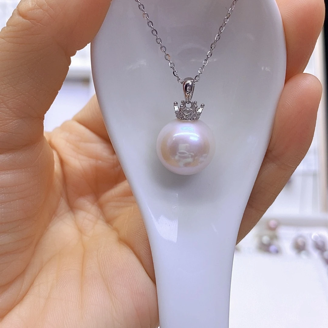 淡水珍珠银S925镶嵌吊坠(赠链)明****。