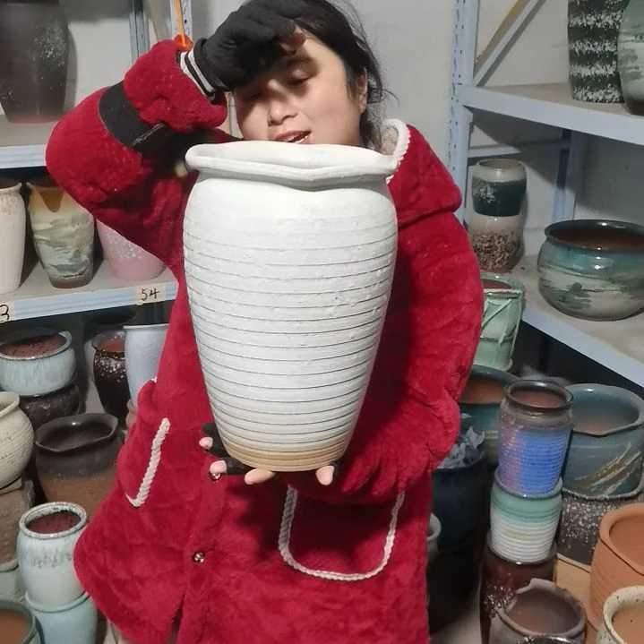 红陶口20高30…～瑕疵底