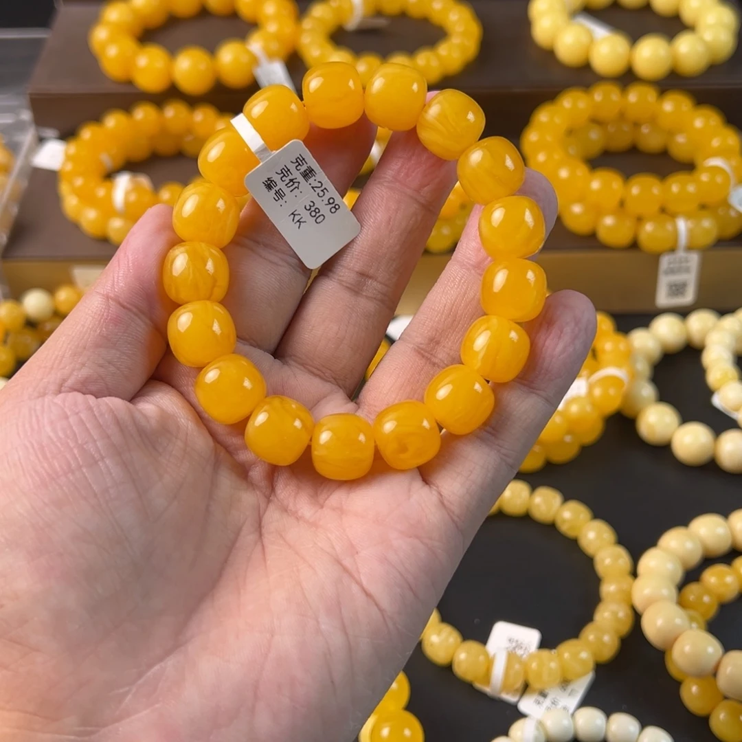 琥珀未镶嵌手串13 m焦皮橘色克重25.98K