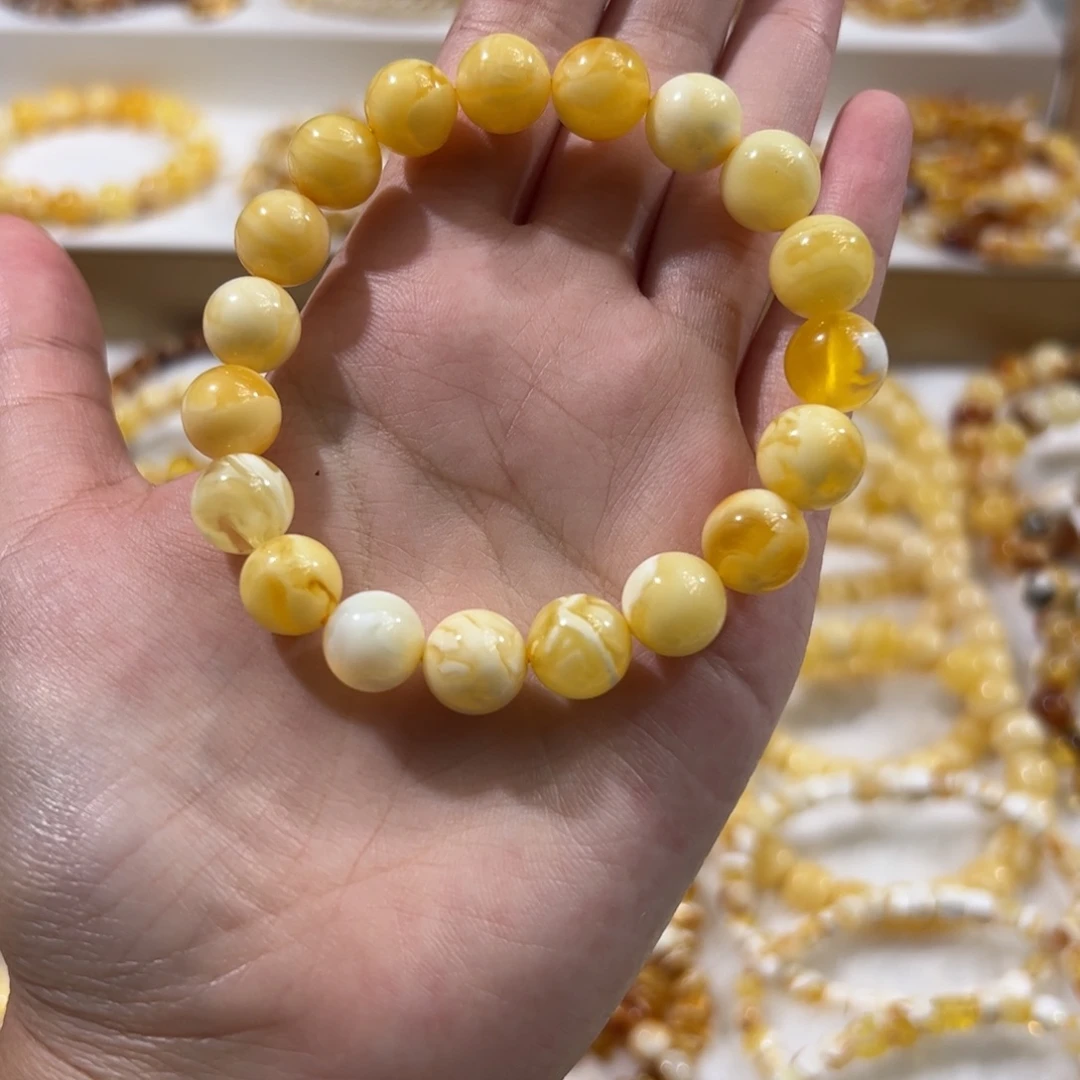 琥珀未镶嵌珠宝奇石浓蜡金瓷白妖花圆珠手串