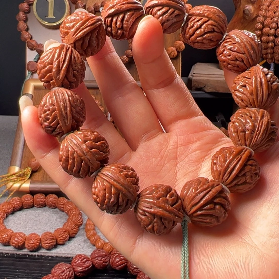 桃核手串21刺龙元宝