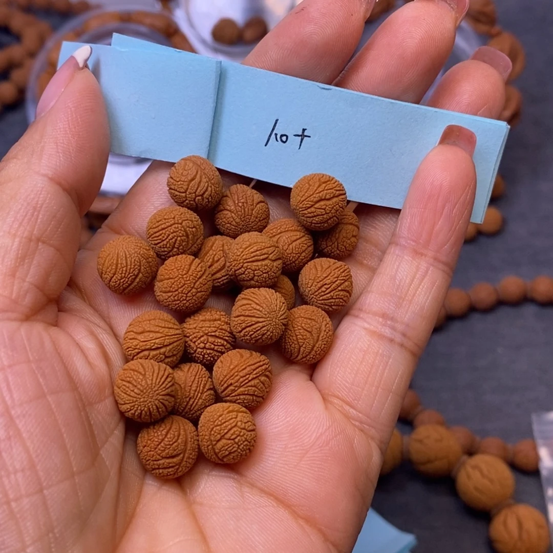 递***长秦岭龙纹桃核21颗