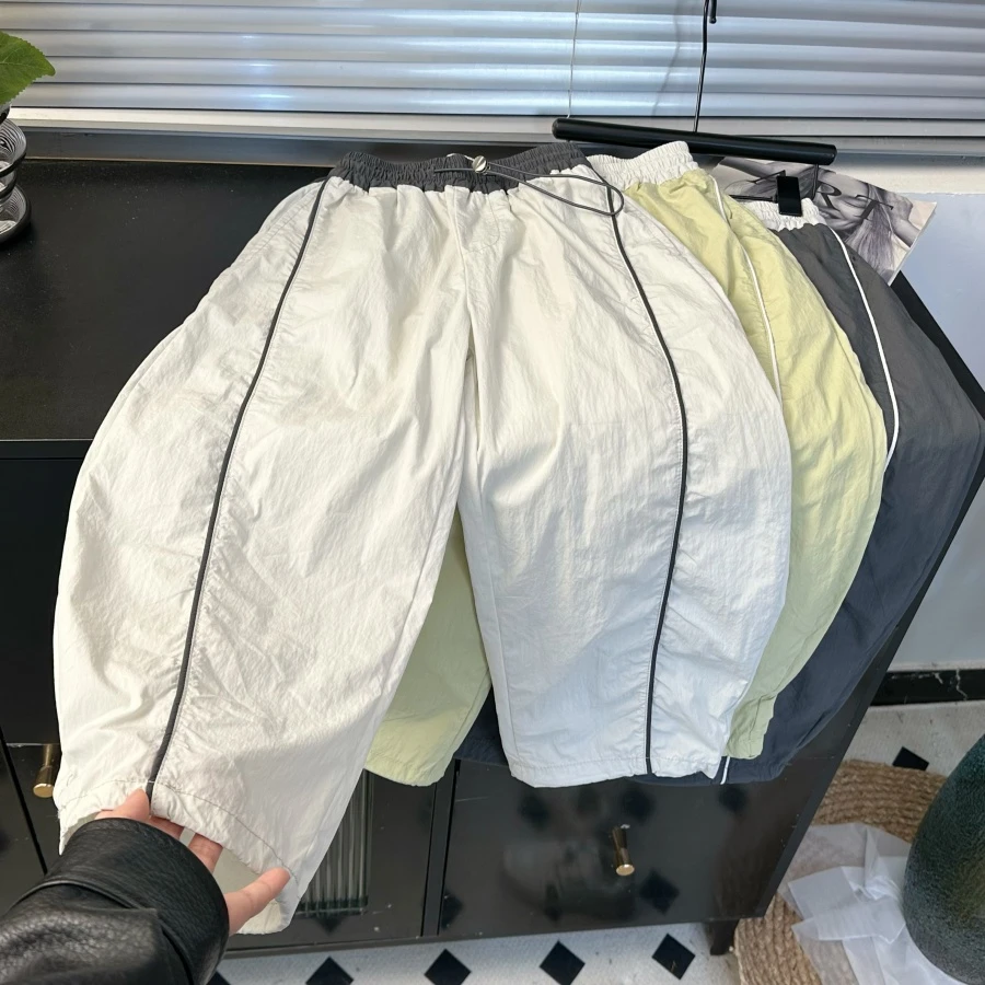《速干裤》夏季新款中大童男童女童拼接运动速干可束脚弯刀裤休闲裤